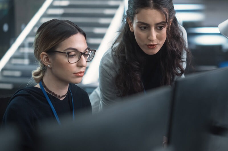 Close up discussion between two network administrators