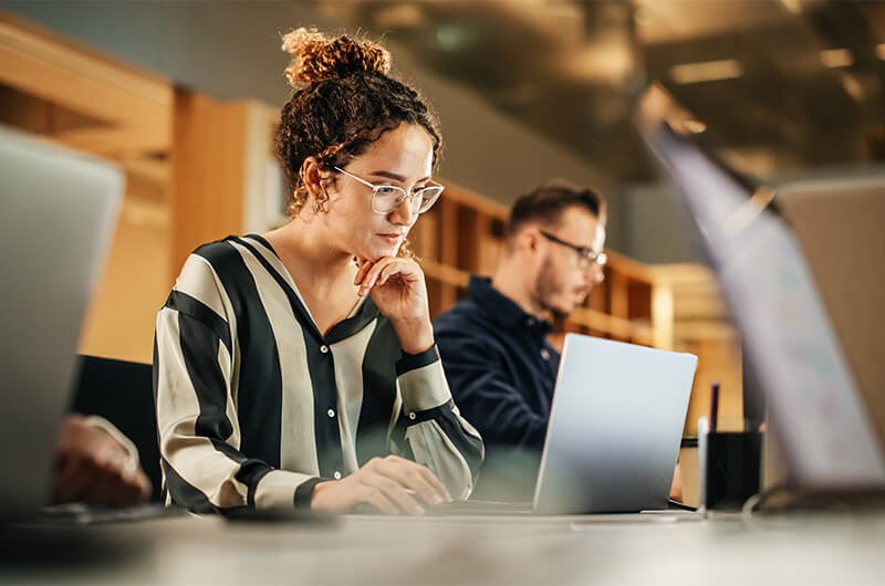 Woman on laptop computer using SnapStart tool